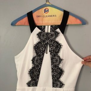 white dress with black lace detail